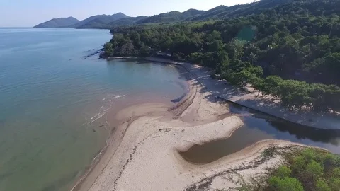 Pan from sea to mountains Stock Footage 80371923