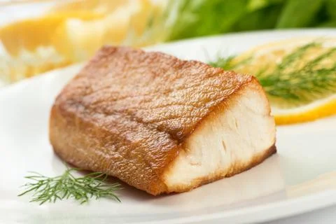 Pan seared fish Stock Photos