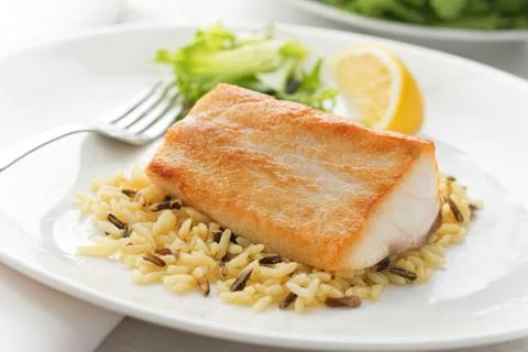 Pan seared fish Stock Photos