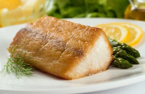 Pan seared fish Stock Photos