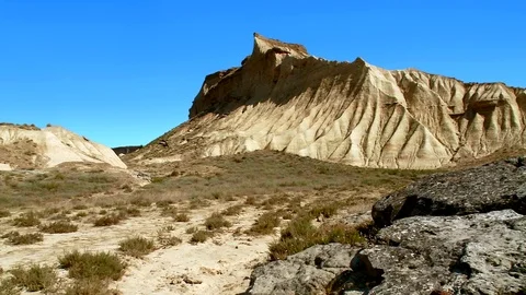 Pan to see rock formations - Bardenas Riales Natural Park, Navarre, Spain Stock Footage 74601093