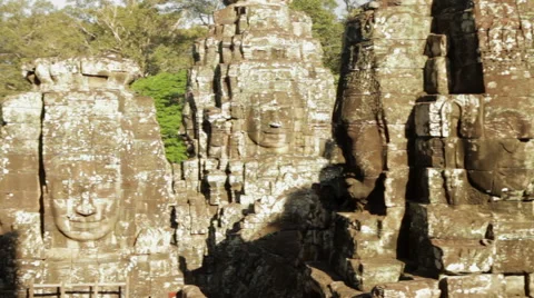 Pan Several Bayon Heads Stock Footage 42675352