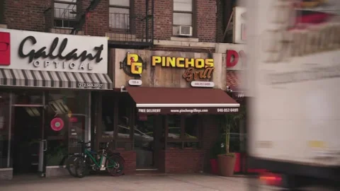 Pan shops NYC street Stock Footage 141831276