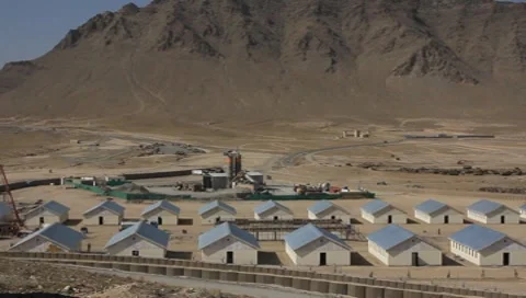 Pan Shot of Afghanistan Military Training Facility and Mountains in Background Stock Footage 7731953