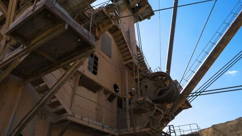 PAN shot of base of dragline Super heavy excavator standing on the side of the Stock Footage 87731770