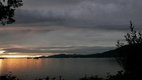 Pan shot of beautiful sunset view at Stanley Park in Vancouver BC Canada 스톡 동영상 71557727