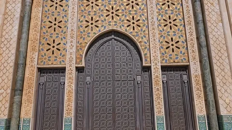 Pan shot on the big Gate in the famous Hassan II Mosque in Casablanca, Morocco Stock Footage 253558748