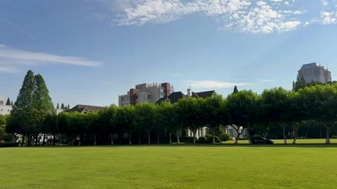 Pan shot from big lawn in front of Historic Xianghui Auditorium Stock Footage 310710688