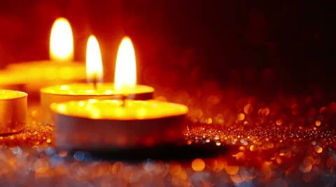 Pan shot of Candles Flickering In the dark 스톡 동영상 43133518