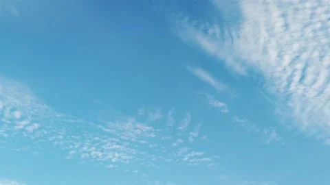 Pan shot of clouds in blue sky Stock Footage 137533445