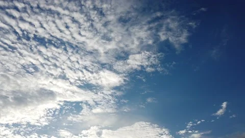 Pan shot of clouds in blue sky Stock Footage 137533478