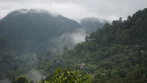 Pan Shot of Clouds on Hills Stock Footage 132111806