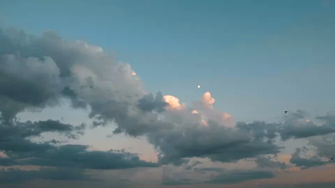 Pan shot, cloudy sky at sunset, slow motion. Stock Footage 92742307