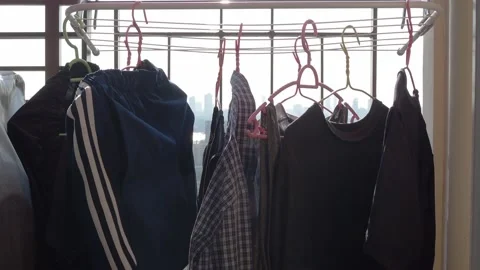 Pan shot of drying clothes in the sun Stock Footage 103209598