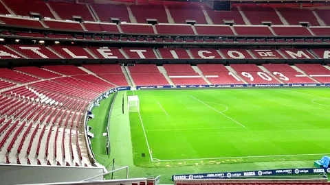 Pan shot of empty Atletico de Madrid football Metropolitano stadium Stock Footage 230461170