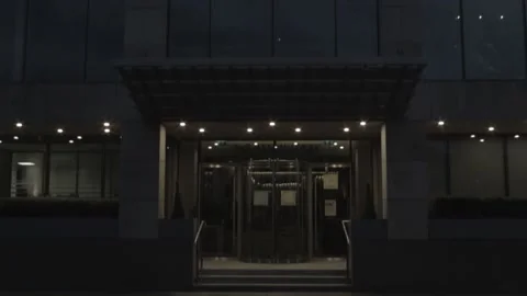 Pan Up Shot of Empty Glass Building Stock Footage