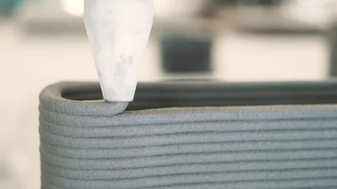 Pan shot Extra Close up Cement Printing Machine is printing high layers Vídeos de archivo 243976239