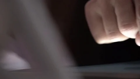 Pan shot of finger touching tablet Stock Footage 74625695