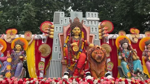 A pan shot of an idol of Maa Durga along with other gods and goddess on a Stock-Footage 295746542
