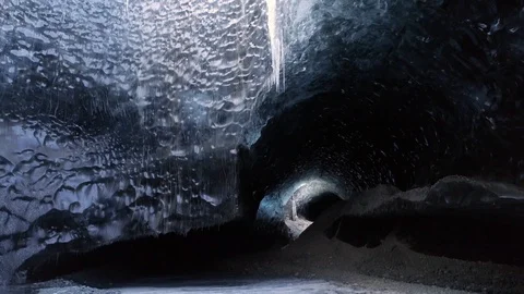 Pan up shot of inside of ice cave in land of Breidamerkurjokull, Iceland Stock Footage 120475739