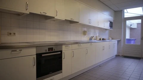 Pan Shot Inside A Kitching With Lots Of Space Video stock 126700511