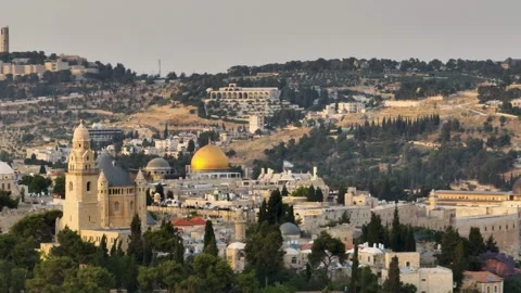 Pan shot of Jerusalem old city skyline with Dormition Abbey and Dome of the Rock Stock Footage 341507945