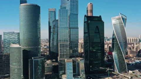 Pan shot left to right of Moscow city skyscrapers in a day time Stock Footage 130520503