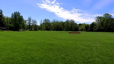 Pan Shot of a Lonely Park Bench Video stock 77630982