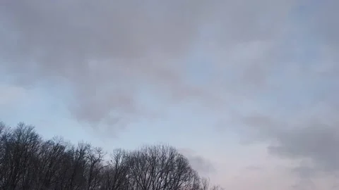 A Pan Shot Looking Up at Snow Clouds Stock Footage 147100535