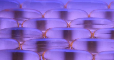 Pan shot, macro view: Vitamins supplements pills omega 3. Fish oil capsules Stockbeeldmateriaal 108103484