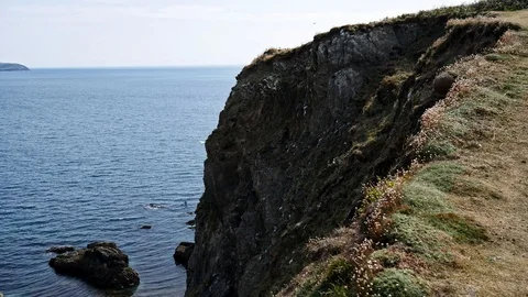 Pan shot of massive cliffs Stock Footage 115313063