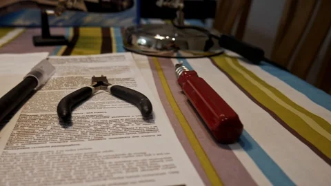 Pan shot of model construction tools on table 스톡 동영상 112068414