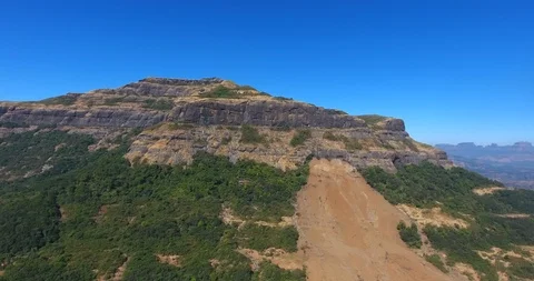 Pan shot of mountain ranges in a forests of India Stock Footage 117123032