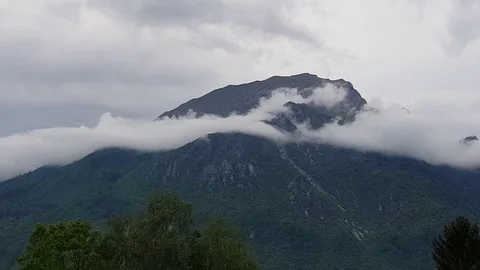 Pan shot of mountains and clouds Video stock 89748830