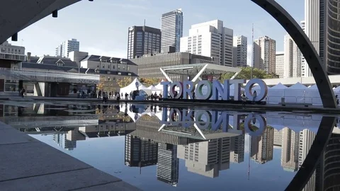 Pan shot of Nathan Phillips Square, City Hall, Toronto Stock Footage 72231910