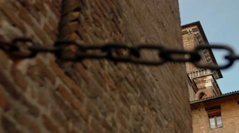 Pan shot of one tower of the Estense castle. Video stock 64898020