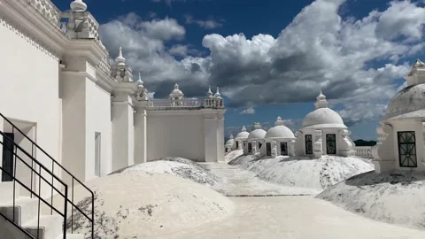 Pan shot over Cathedral of Leon, Nicaragua. Rooftop of a white-colored cathedral Stock Footage 225432828