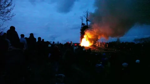 Pan shot over huge camp fire Stock Footage 47474493