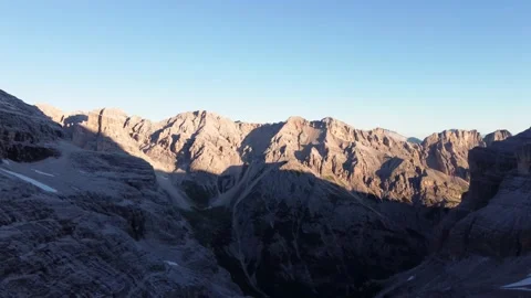 Pan shot over a rough mountain panorama in the morning Video stock 159437259