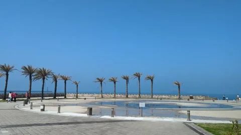 Pan shot of People visiting Heping Island Geopark in Taiwan on a sunny day Stock Footage 313485911