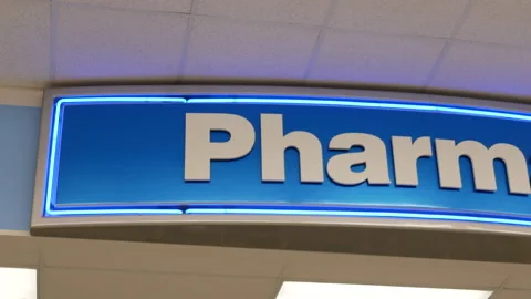 Pan shot of pharmacy sign inside London drugs store with 4k resolution Stock Footage 90207719
