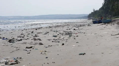Pan shot of plastic garbage and trash on the beach. static shot Stock Footage 51025789