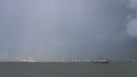 Pan shot. Raining storm and tanker ship park in sea, Crude oil tanker and LPG Stock Footage 132019523