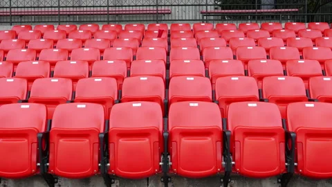 Pan shot of red empty seats in stadium with 4k resolution Stock Footage 141235319