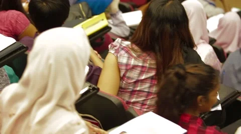 Pan Shot of Students Listening to Lecture Inside A Lecture Hall in Allianze Stock Footage 49388250
