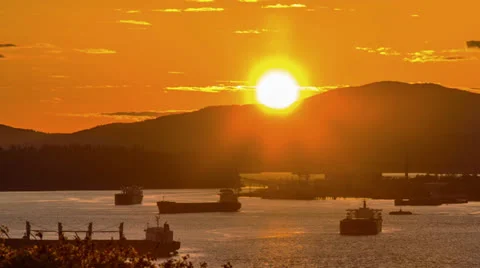 Pan shot time lapse of Lion Gate Bridge at Sunset Stock Footage 24348132