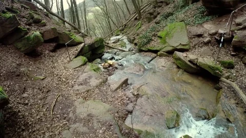 Pan shot towards a waterfall Stock Footage 73275243