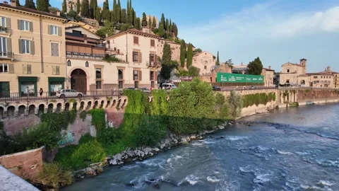Pan shot upstream of river Adige in Verona Stock Footage 342398163