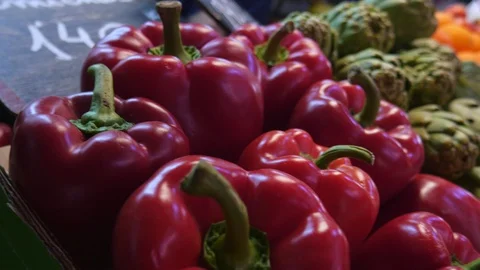 Pan shot of a vegetable stall at a local farmers market Stock Footage 124405799