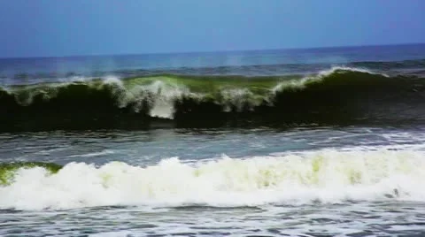 Pan shot of waves splashing in an ocean Stock Footage 30032205